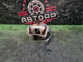 Супорт задний левый